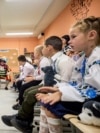 UKRAINE -- Children mark the start of the new school year, known as the 'Day of Knowledge,' at an underground school in Kharkiv, Ukraine, 02 September 2024