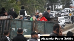 ARMENIA - Vehicles carrying refugees from Nagorno-Karabakh arrive in Kornidzor, September 26, 2023.