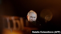 Действующий российский глава Владимир Путин.