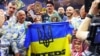 Олександр Усик святкує перемогу над британцем Тайсоном Ф'юрі, здобувши титул абсолютного чемпіона світу в надважкій вазі. Ер-Ріяд, Саудівська Аравія, 19 травня 2024 року