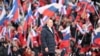 Президент России Владимир Путин на концерте, посвященном восьмилетию «присоединения» Крыма. Международное сообщество считает захват украинского полуострова аннексией. Москва, 18 марта 2022 года.