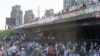 Protesters block traffic on the main highway passing through Belgrade on June 30.