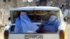 A new Taliban advisory says that women should not be offered transport for long trips unless they are accompanied by a close male relative. (file photo)