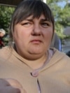 Survivors Of Russia's Attack On Kyiv Sort Through Aftermath GRAB