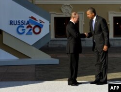 Президент России Владимир Путин приветствует президента США Барака Обаму. Санкт-Петербург, 5 сентября 2013 года.