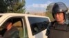 After Night Of Bloodshed, Kyrgyz Police Regroup And Arrest Atambaev