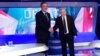 Кандидати на президента Польщі Ярослав Качинський (праворуч) та Броніслав Коморовський під час теледебатів у Варшаві за чотири дні до другого туру президентських виборів