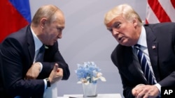 Владимир Путин и Дональд Трамп. Архивное фото