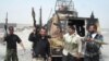 Al-Mahdi Army fighters in Al-Basrah on March 27
