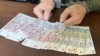“137 000 сомонӣ гирифтанд.” Парвандаи як афсари милиса дар додгоҳ